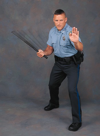 cop_with_baton.jpg